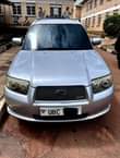 A picture of Subaru SG5 non turbo. Has projectors high beam white full