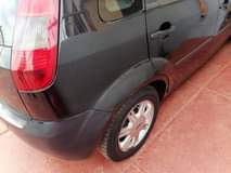 Tumzaza K.