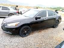 A picture of 2009 Honda Accord Untampered engine Sweet leather interior Chilling AC