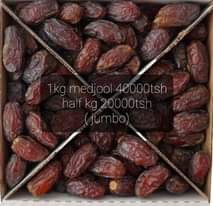 A picture of Pistachio kernels medjool dates and ajwa dates fresh stock available