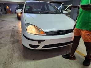 A picture of 2005 model Ford Focus registered..... Flashed on First body..... Engine