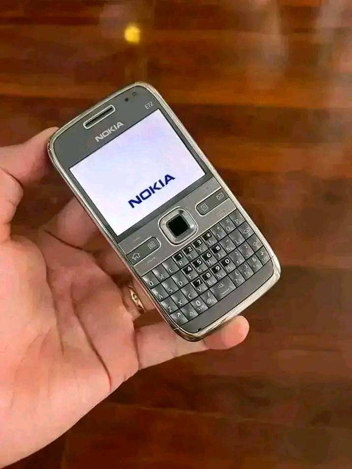 A picture of QWERTY KEYBOARD BUTTON PHONE NOKIA E72 WITH WHATSAPP FACEBOOK YOUTUBE