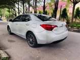 A picture of Toyota Corolla 2015 upgraded to 2018