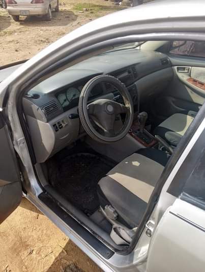 A picture of Distress Very sharp Toyota Corolla LE 2004 everything blessed with