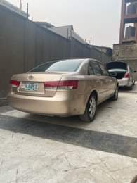 A picture of Hyundai sonata 2006 4 plugs engine and gear untouched a