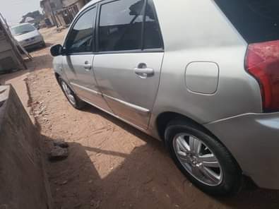 A picture of TOYOTA COROLLA OBAMA ENGINE AND GEAR AC IS WORKING NEAT