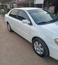 A picture of JUST IN Clean Nigerian Used White Toyota Corolla 2004 Baked