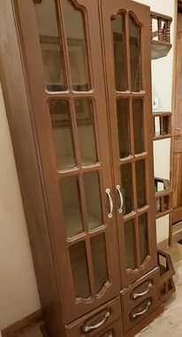 A picture of Side wooden mninga cupboard
