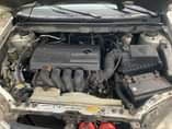 A picture of Toyota Corolla 2004 le first body gear and AC intact
