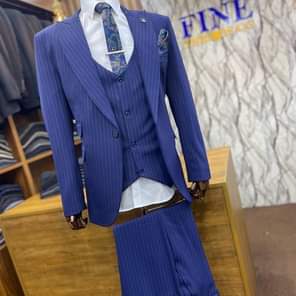 A picture of UG. SHS. 250 000 ONLY YES 250k ONLY SUITS SUITS