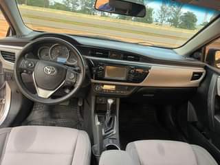 A picture of Belgium grade 2015 Toyota corolla with original papers going for