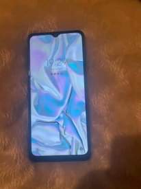 A picture of Samsung a12 internal 64gb ram 4gb haina kipengele nicheck tuzungumze