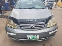 A picture of 9ja used Corolla 2004 LE First body first registration Engine