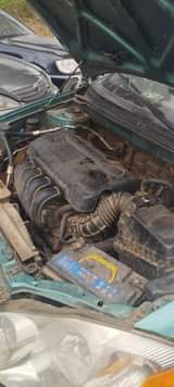 A picture of Ibadan 06 corolla 1 8 Engine gear and AC Okay
