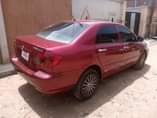 A picture of Sharp Toyota Corolla LE 2006 Red