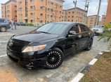 A picture of This is Camry 2010 model sport utility few months registered