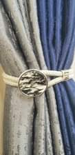 A picture of Curtains and cushions curtain rods
