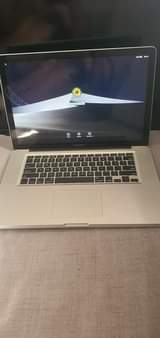 A picture of Macbook pro 15 Core i7 Ram 8 gb 128 gb
