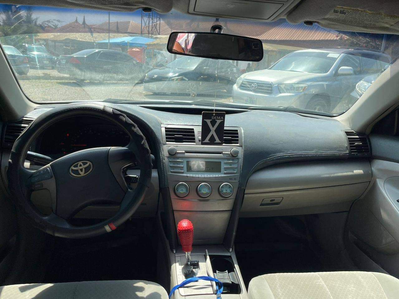 A picture of Super sharp 2008 Toyota Camry with untempered engine and gear