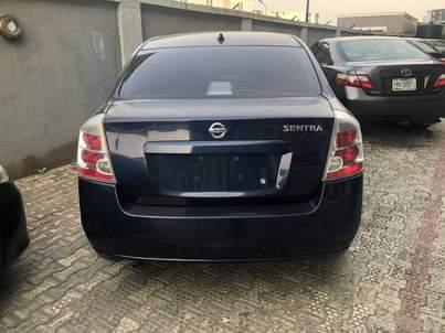 A picture of URGENT BUYER NEEDED Nissan Sentra 2009 model Factory AC clean