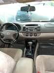 A picture of Toyota Camry 2004 4plugs painted on first body Engine gear