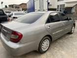A picture of Registered Toyota Camry 2004 Model Interior Clean remote entry painted