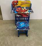 A picture of Kids reading tables