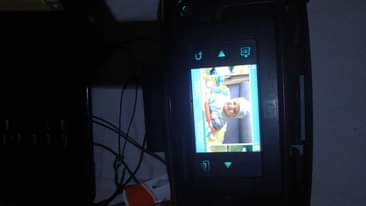 A picture of Nikon D7000 hp passport photo printer