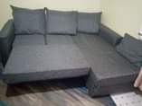 A picture of L shaped pullout sofa bed