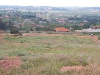 A picture of Sisa estate on sale with titles along hoima road Call