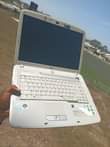 A picture of accer core 2duo Ram 2gb hdd 320gb procesor 1.47ghz chaji