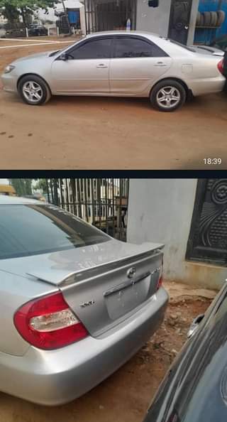 A picture of Firstbody clean TOYOTA CAMRY 2005 model Engine and gear and