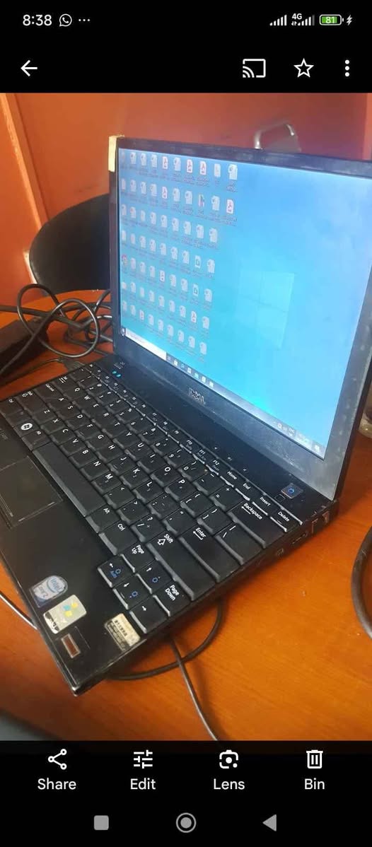 A picture of Dell laptop for sale. Battery need replacement