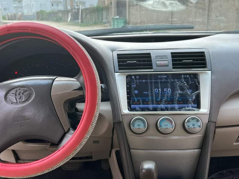 A picture of Toyota Camry 2008 model With an ANDROID SCREEN Neatly baked