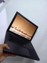 A picture of MacBook HDD 250GB RAM 4GB bluetooth WiFi bettry 4hrs Tell.
