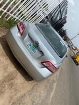 A picture of Toyota Camry 2010 1month used register accident free
