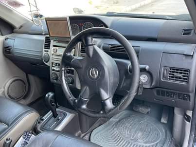 A picture of Nissan xtrail Dashboard kubwa Price mil 10.5 Full ac Clean