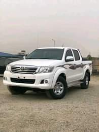 A picture of PRE OWNED Super Clean 2014 Barely Driven Toyota Hilux With