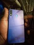 A picture of Tecno spark 3 with some cracks but working well clear