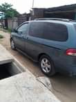 A picture of 2002 Toyota Sienna Complete First Body Engine Gear Ac Absolutely
