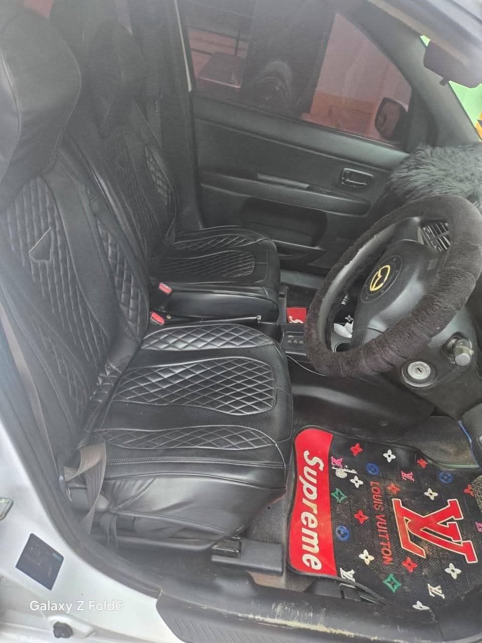 A picture of 2003 Mazda demio