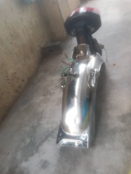 A picture of honda 125 back motorguard