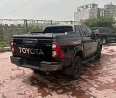 A picture of FOREIGN USED 2021 BULLETPROOF TOYOTA HILUX ADVENTURE Black on Black