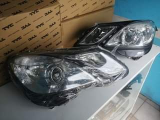 A picture of W212 Preface Normal Headlights in Stock For Sale