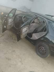 A picture of Black Toyota Camry for sale everything is working perfectly okay