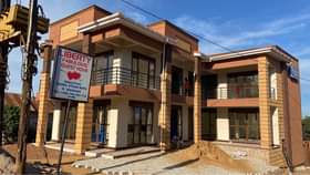 A picture of Bweyogerere Jinja Road Acarde On Sale 750million Income 7million 13decimals