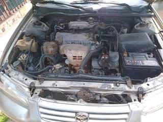 A picture of Super clean Toyota Camry 1999 Model. Tiny light 