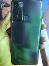 A picture of INFINIX HOT12i. 64gb AT 200K