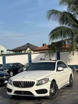 A picture of Barely driven Foreign C300 2015 luxury Pano Roof features