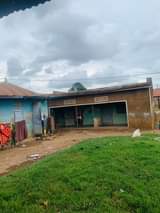 A picture of PLOT WITH OLD RENTALS FOR SALE KAMPALA BWAISE 45m